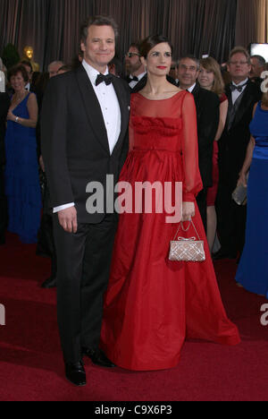 COLIN FIRTH & LIVIA GIUGGIOLI die 84. ACADEMY AWARDS Ankünfte LOS ANGELES Kalifornien USA 26. Februar 2012 Stockfoto