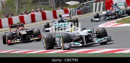 Den 13.05.2012. Catalunya, Barcelona, Spanien.  Deutsche Formel1-Fahrer Nico Rosberg von Mercedes AMG (vorne), französischer Formel-1 Fahrer Romain Grosjean von Lotus, venezolanischer Autorennfahrer Pastor Maldonado von Williams und deutsche Formel1 Rennfahrer Michael Schumacher von Mercedes-AMG während der Grand P Stockfoto