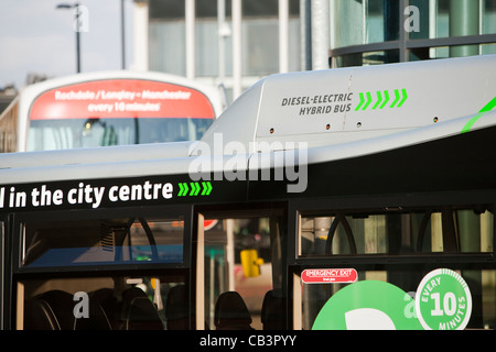 Ein Diesel-Elektro-Hybrid-Shuttle-Bus, der einen kostenlosen Service bietet rund Manchester Stadtzentrum, Stockfoto