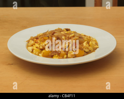 Salzfisch und Ackee Jamaika Nationalgericht mit Salzfisch, Ackee Frucht, Paprika, Tomaten, Chili und Zwiebel Stockfoto