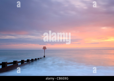 Sunrise, Swanage Bay, Dorset, Großbritannien Stockfoto