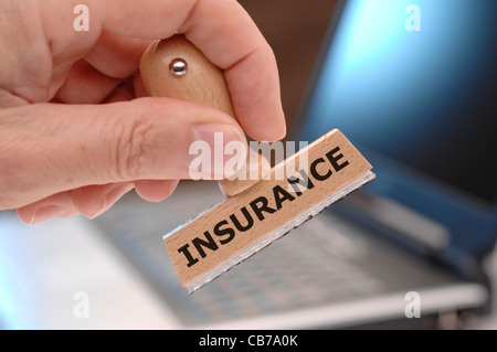 Gummistempel mit Versicherung gekennzeichnet Stockfoto