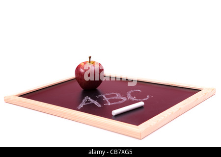 Zurück zu Schule Briefe geschrieben auf einer Tafel mit bunten Büchern (Tiefenschärfe) Stockfoto