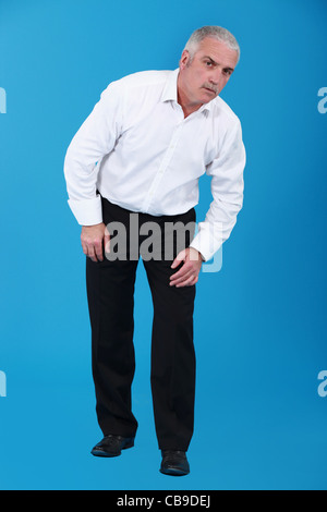 Neugierig grauen Haaren Geschäftsmann Stockfoto