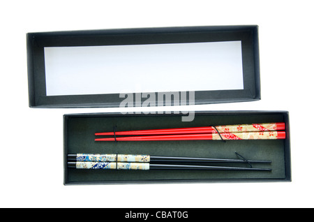 isolierte chinesische Stäbchen in der Black box Stockfoto