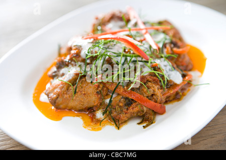 Fisch mit roter Curry-sauce Stockfoto