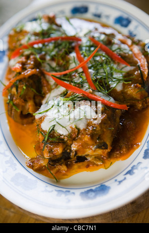 Fisch mit roter Curry-sauce Stockfoto