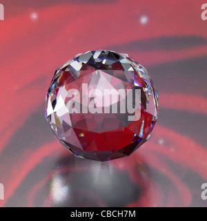 Studiofotografie einer Diamant-Kugel aus Glas in rot abstrakt Rücken gemacht Stockfoto