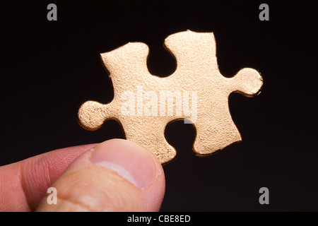 Goldene Puzzle, Geschäftskonzept, Lösung Stockfoto