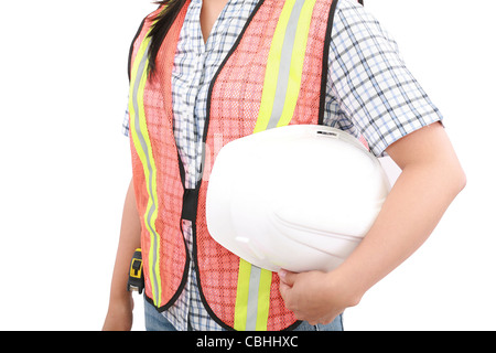 Ingenieur-Frau hält einen Helm, isoliert auf weiß Stockfoto