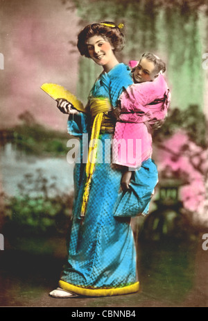 Schönes Modell als Japanerin Kimono gekleidet Stockfoto