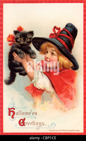 Kleines Mädchen Halloween Hexe mit schwarzer Katze Stockfoto