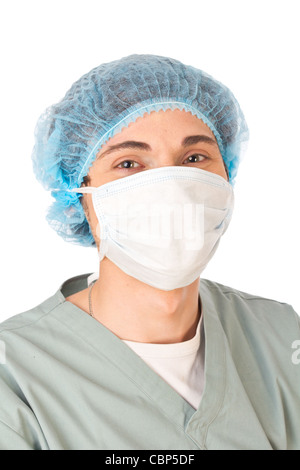 Glückliche junge Arzt tragen Mütze und Maske auf weißem Hintergrund Stockfoto