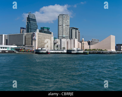 dh TSIM SHA TSUI HONG KONG Tsim Sha Tsui Star Ferry Pier Kowloon Uhr Waterfront Wolkenkratzer Gebäude Stockfoto