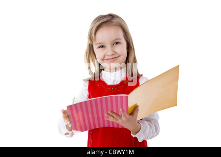 kleines Mädchen ein Buch isoliert auf weiss Stockfoto