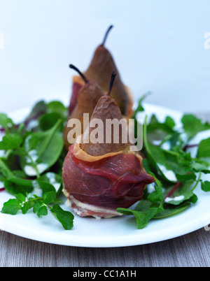 Gebackene Birnen und Prosciutto Stockfoto