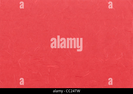 Rotes Papier Textur mit Haaren. Stockfoto