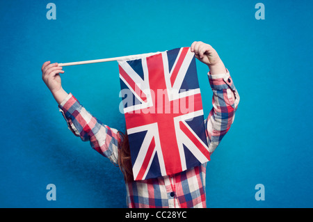 Ein junges Mädchen, eine britische Flagge Stockfoto