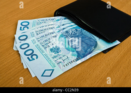 Polnisch-Geld - Zloty, Banknoten und Brieftasche auf dem Tisch Stockfoto