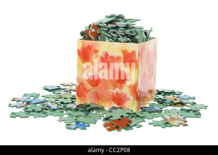 Jigsaw Puzzle-Teile in Box Stockfoto