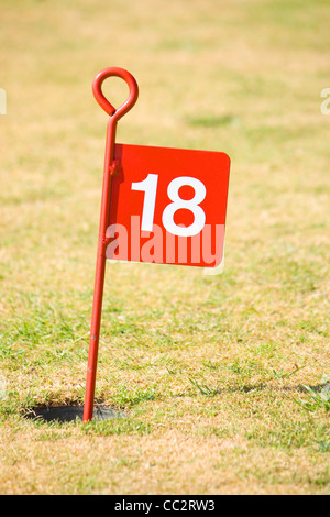 18. Loch auf ein Putting Green. Stockfoto