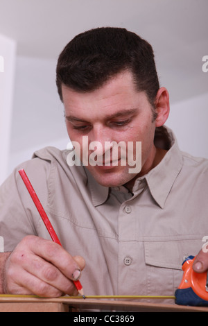 Tischler Holz messen Stockfoto