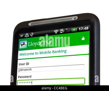 Anmeldung bei mobilen Internet-Banking mit der Lloyds TSB-app auf einem HTC-smartphone Stockfoto