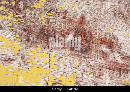 Abblätternde gelbe Farbe verblasst Holz Hintergrund Stockfoto