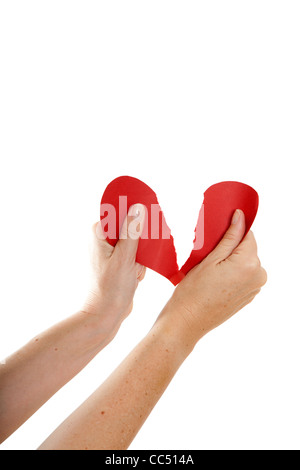 Hände, die Rippen Papierherz Stockfoto