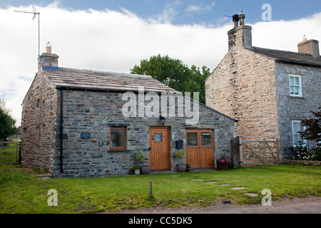 Die alte Schmiede, jetzt ein kleines Ferienhaus im Dorf Aysgarth lassen. Stockfoto