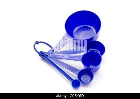 Satz von Messung Löffel Closeup auf weiß blau Stockfoto