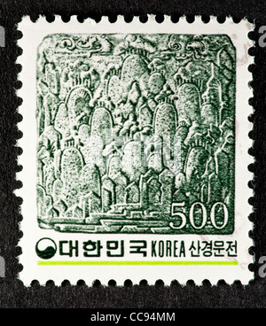 Briefmarke aus Südkorea Berglandschaft in Backstein Basrelief Darstellung. Stockfoto