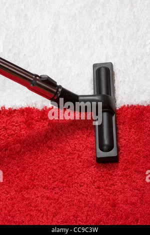 Rohr auf dem Teppich Reiniger Stockfoto