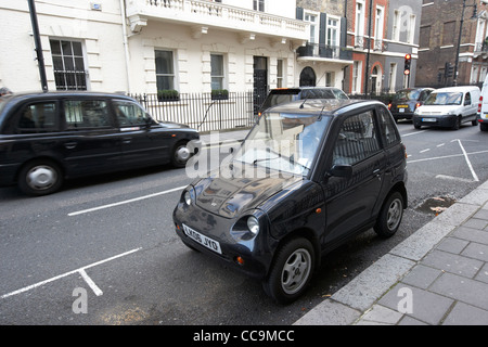 g-Wiz Elektroauto geparkt in Mayfair London England UK-Vereinigtes Königreich Stockfoto