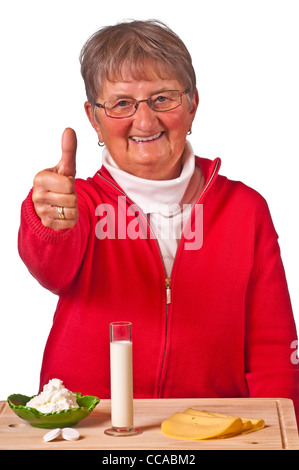 Rentner mit Milchprodukten Stockfoto