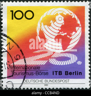 Deutschland - ca. 1991: Eine Briefmarke gedruckt in Deutschland, widmet sich der 25. Internationalen Tourismusbörse, Berlin, ca. 1991 Stockfoto