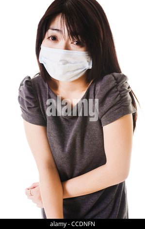 Nahaufnahme einer Kranken modische chinesische Frau eine Gesichtsmaske tragen. Stockfoto