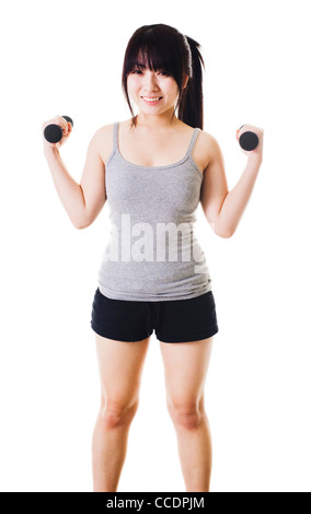 Chinesische Frau mit zwei Hanteln. Stockfoto