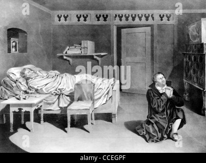 Martin Luther betet für seinen Freund, Philipp Melanchthon, der nahe Tod erscheint. Stockfoto
