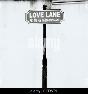 Straßenschild in Love Lane in Chinatown in George Town in Insel Penang in Malaysia in Fernost Südostasien. Konzept Konzeptionell Romantik Reisen Stockfoto