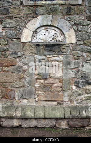 Der blockierte Anglo Saxon West Tür mit geschnitzten Tympanon, St John the Baptist Church, Ault Hucknell, Derbyshire Stockfoto