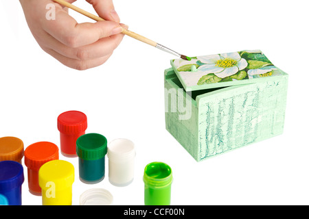 Bemalte und verzierte Holzkiste und Farbe Stockfoto