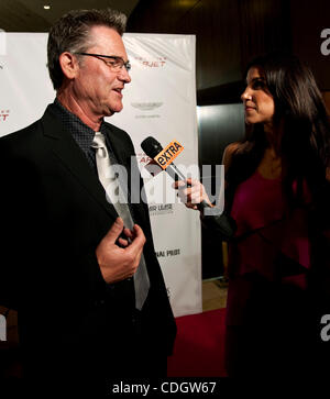 21. Januar 2011 - Beverly Hills, Kalifornien, USA - KURT RUSSELL und ADRIANNA COSTA zu den lebenden Legenden der Luftfahrt-Gala im Beverly Hilton Hotel. Stockfoto