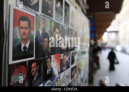 Porträts der Präsidenten von Syrien Bashar al Assad (al Asad) und Hisbollah Shi ' a moslemischen militante Gruppenführer Hassan Nasrallah auf der Wand des Gebäudes im Zentrum von Damaskus (5. Februar 2011. Damaskus, Syrien). Stockfoto