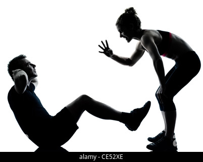 ein paar Mann Frau trainieren Training der aeroben Fitness Haltung voller Länge Silhouette Studio isoliert auf weißem Hintergrund Stockfoto