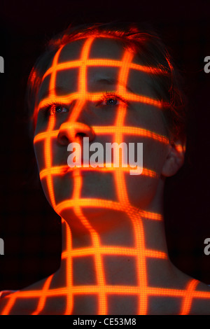 Biometrie, Symbolfoto. Automatische Gesichtserkennung mit einem Laserscanner. 3D-Modell eines weiblichen Gesichts zur Erzeugung von digitalen Daten. Stockfoto