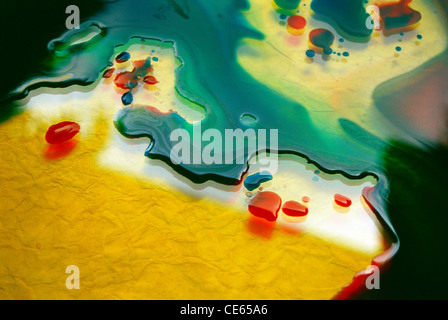 abstract painting with colors on glass sheet Stockfoto