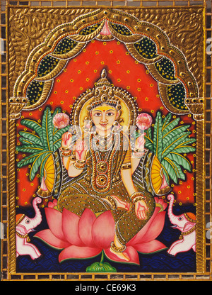 Göttin Lakshmi sitzen in der Lotus-Miniaturmalerei auf Papier mit gold-Prägung Stockfoto