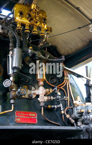 Die Dampfmaschine Kontrollen von Kingston Flyer in Neuseeland Stockfoto