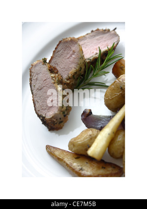 Slow Roasted Pork Chop mit Fenchel und Knoblauch Kartoffeln Stockfoto